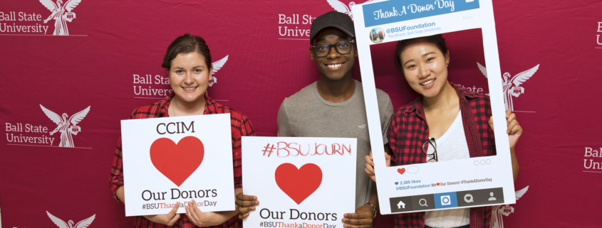 Graduate students Bonnie Greene, Davonte Longmire and Yuanwei Lyu take part in Thank a Donor Day.