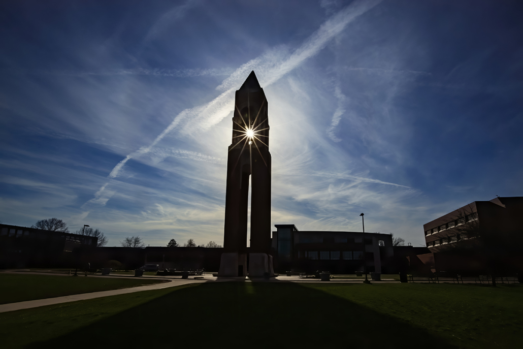 Sun shines through Shafer Tower