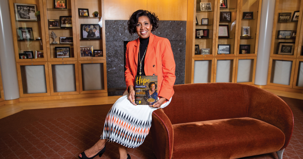 Angelia White-Stone holding an issue of "Hope" magazine