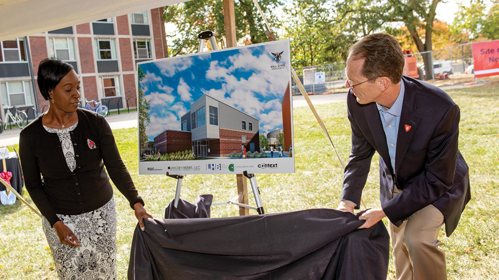 Ro-Anne Royer Engle and President Mearns unveil the new Multicultural Center in 2019